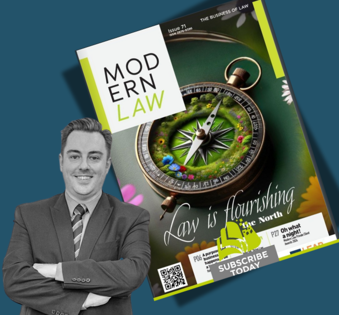 Jonathon Waterhouse with the front cover of Modern Law Magzine